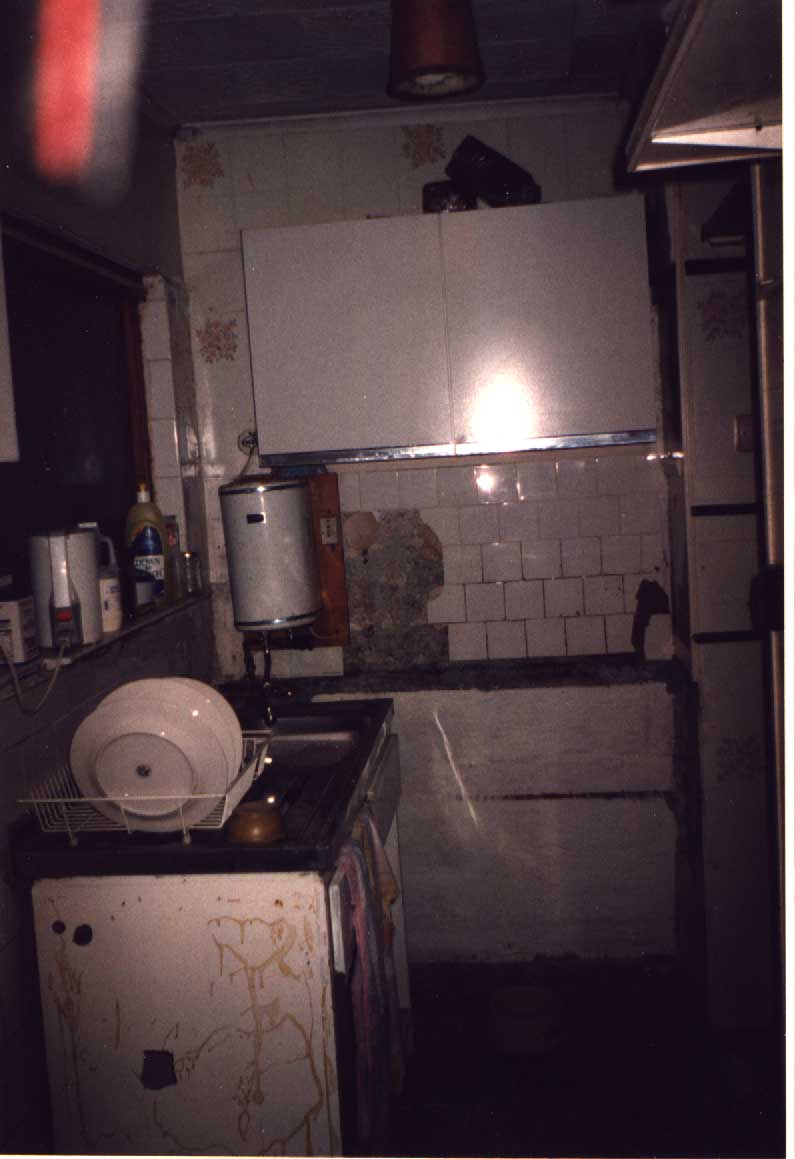 end wall in kitchen, opposite door